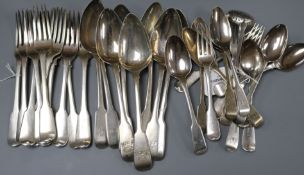 A composite part service of George III silver fiddle pattern flatware, crested and initialled,