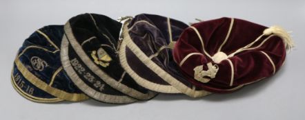 Four school caps