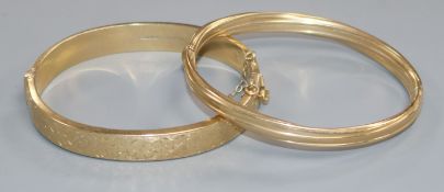 Two 9ct gold bangles.