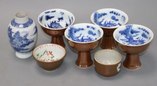 Four Chinese cafe au lait glazed stem cups and two bowls and a blue and white tea caddy tallest 11.