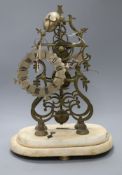 A 19th century brass skeleton clock, missing dome, (a.f.)