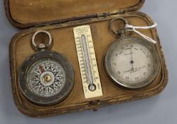 A Hughes & Son pocket barometer, compass and thermometer set, cased