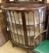 A mahogany bow-fronted display cabinet W.120cm