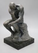 A bronze of a kneeling gentleman,'The Thinker', signed A. Rodin, on marble base, height 40.5cm