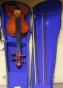 A full size violin with label for Vuillaume, cased and two bows