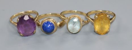 Three 9ct gold dress rings, set amethyst, citrine and lapis lazuli and another 9ct gold dress ring.