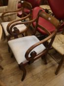 Two Regency mahogany elbow chairs