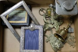 Two silver frames, a plated teapot, an Indian bell and furniture mounts