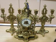 A French ormolu mantel clock with associated garniture height 43cm