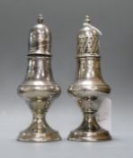 A pair of modern silver pedestal pepperettes, Birmingham, 1973, (1 a.f.), 13.5cm.