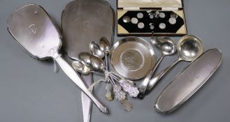 A silver mounted mirror and two brushes, two silver ladles and other items including Chinese