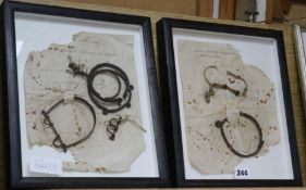 Antique African charms, two framed displays with notes of origin