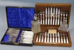 Two silver scent bottles and two sets of cased fish eaters