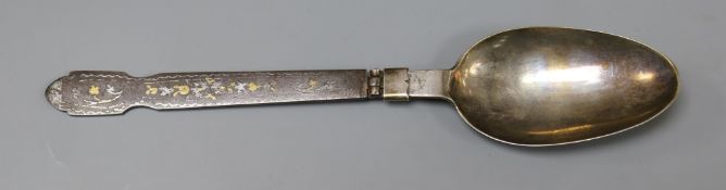 A late 18th century Austro-Hungarian silver and damascened iron folding campaign spoon, dated