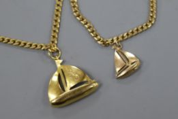 An 18ct gold curb-link chain with 18ct gold yacht pendant and a similar bracelet (tests as 14ct)