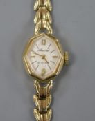 A lady's Accurist 9ct gold-cased cocktail watch on on 9ct gold flexible fancy link bracelet