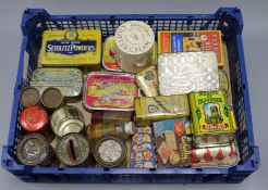 A collection of mixed advertising tins and packets for food