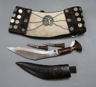 A belt decorated with Argentinian coins and a kukri