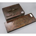 A carved wooden printing block for gesso decoration and another