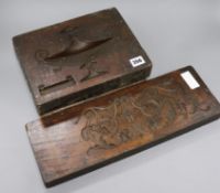 A carved wooden printing block for gesso decoration and another