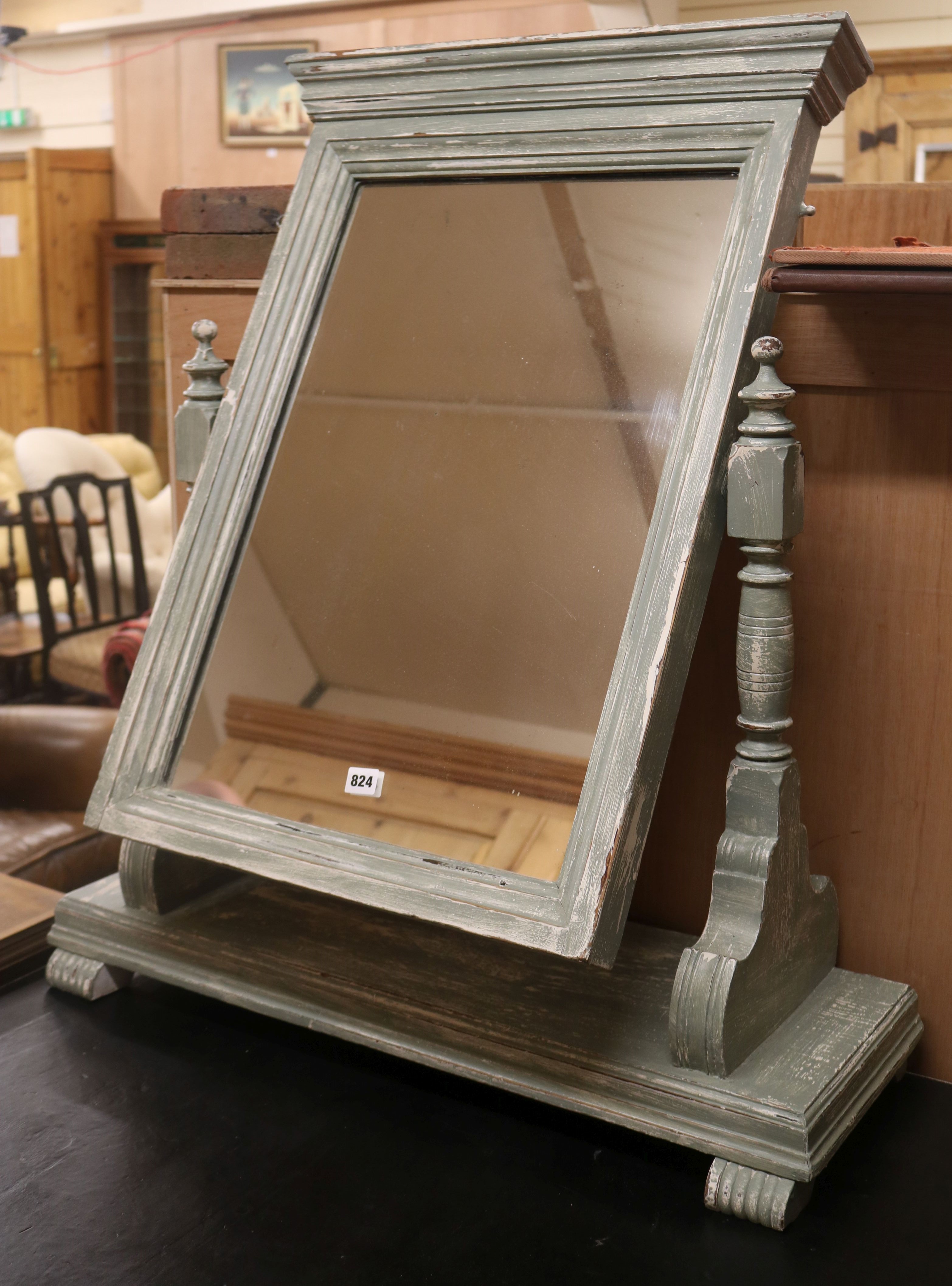 A large painted toilet mirror W.82cm