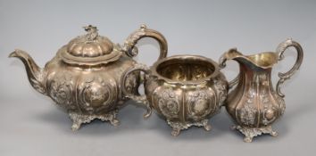 A Victorian embossed silver three-piece tea service, London 1848/50, makers Samuel Hayne & Dudley