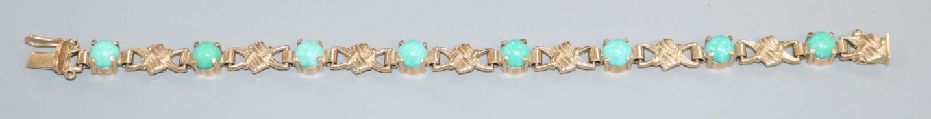 A 9ct gold fancy link bracelet set with cabochon turquoise, 18.5cm.