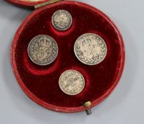 A 1909 Maundy Set, in circular red case stamped in gilt 'The Royal Maundy Money'