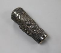 An Indian embossed white metal cane handle, 9.3cm.