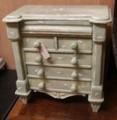 A miniature painted chest of drawers W.48cm