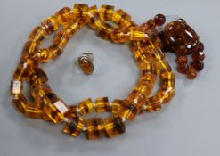 An amber necklace, bracelet, ring and brooch.