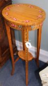 A pair of Sheraton design satinwood urn stands W.32cm