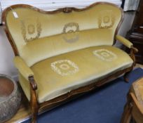 A 19th century Continental walnut double spoonback settee W.167cm