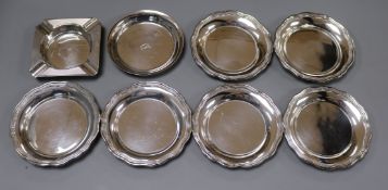 A set of six modern small silver dishes, one other silver dish and a silver ashtray, 14.5 oz.