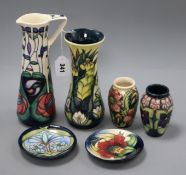 A group of Moorcroft including a jug, three vases and two pin dishes tallest 24.5cm (6)