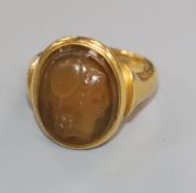 A late Victorian 18ct gold and carved oval cameo ring, size L.