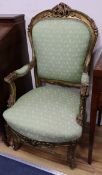 A pair of Louis XV style carved giltwood fauteuils