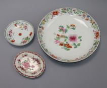 An 18th century Chinese export famille rose dish, toy dish and a saucer (3) Largest 28cm diameter