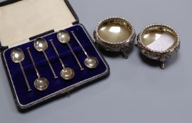 A pair of Victorian silver bun salts, Sheffield, 1877 and cased set of six silver coffee spoons.