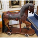 A painted wood child's horse W.103cm