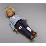 A vintage blonde 'Gregor' Sasha doll, denim outfit, good condition