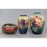 Two Moorcroft 'Spring Flowers' vases and an unusual Moorcroft Pomegranate bowl (damaged) Tallest