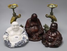 Three Chinese figures of Budai wood porcelain and composition and pair of candlesticks