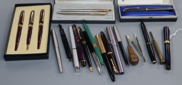 Assorted fountain pens, pencils, etc
