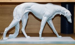 An Art Deco style painted model of a Borzoi 56cm wide x 31cm high