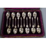 A matched cased set of twelve silver apostle spoons, Edward Hutton, London, 1885/6 and London,