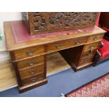 A late Victorian mahogany nine drawer pedestal desk W.137cm
