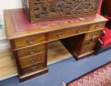 A late Victorian mahogany nine drawer pedestal desk W.137cm