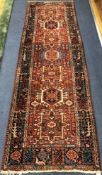 A Persian rug 260 x 68cm
