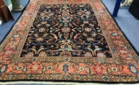 A Persian blue ground carpet 350 x 270cm